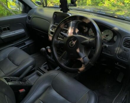 Черный Ниссан Навара, объемом двигателя 2.5 л и пробегом 140 тыс. км за 5013 $, фото 1 на Automoto.ua