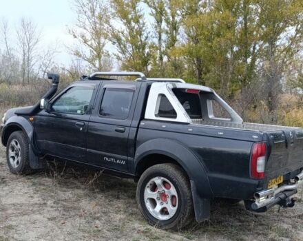 Черный Ниссан Навара, объемом двигателя 2.5 л и пробегом 100 тыс. км за 5300 $, фото 11 на Automoto.ua