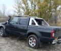Черный Ниссан Навара, объемом двигателя 2.5 л и пробегом 100 тыс. км за 5300 $, фото 11 на Automoto.ua