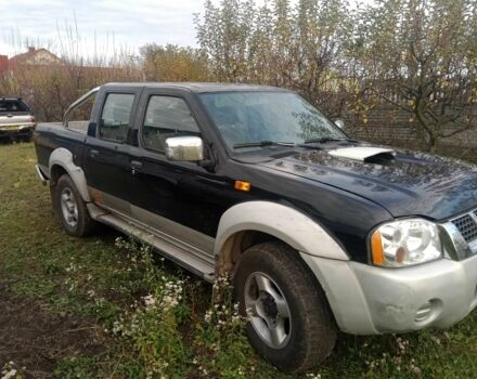 Чорний Ніссан Навара, об'ємом двигуна 2.5 л та пробігом 350 тис. км за 6174 $, фото 3 на Automoto.ua