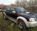Чорний Ніссан Навара, об'ємом двигуна 2.5 л та пробігом 350 тис. км за 6174 $, фото 3 на Automoto.ua