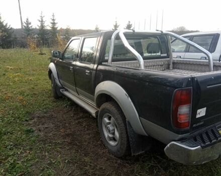 Чорний Ніссан Навара, об'ємом двигуна 2.5 л та пробігом 350 тис. км за 6174 $, фото 7 на Automoto.ua