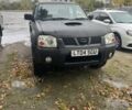 Чорний Ніссан Навара, об'ємом двигуна 2.5 л та пробігом 225 тис. км за 5900 $, фото 1 на Automoto.ua
