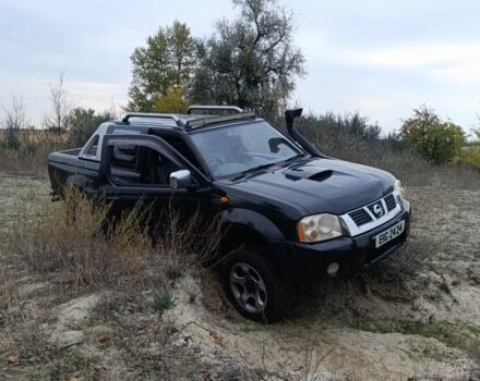 Черный Ниссан Навара, объемом двигателя 2.5 л и пробегом 100 тыс. км за 5300 $, фото 9 на Automoto.ua