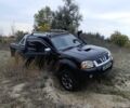 Черный Ниссан Навара, объемом двигателя 2.5 л и пробегом 100 тыс. км за 5300 $, фото 9 на Automoto.ua