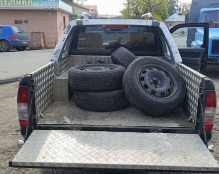 Черный Ниссан Навара, объемом двигателя 2.5 л и пробегом 100 тыс. км за 5300 $, фото 14 на Automoto.ua