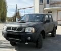 Черный Ниссан Навара, объемом двигателя 2.5 л и пробегом 200 тыс. км за 4400 $, фото 1 на Automoto.ua