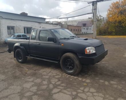 Чорний Ніссан Навара, об'ємом двигуна 2.5 л та пробігом 200 тис. км за 5850 $, фото 2 на Automoto.ua