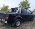 Черный Ниссан Навара, объемом двигателя 2.5 л и пробегом 100 тыс. км за 5300 $, фото 10 на Automoto.ua