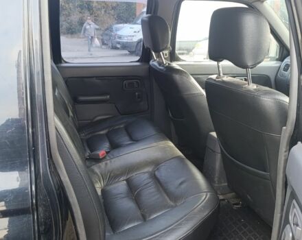 Черный Ниссан Навара, объемом двигателя 2.5 л и пробегом 100 тыс. км за 5300 $, фото 13 на Automoto.ua