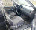Чорний Ніссан Навара, об'ємом двигуна 2.5 л та пробігом 350 тис. км за 6174 $, фото 2 на Automoto.ua