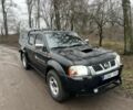 Чорний Ніссан Навара, об'ємом двигуна 2.5 л та пробігом 213 тис. км за 6000 $, фото 1 на Automoto.ua