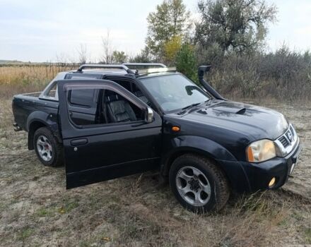 Черный Ниссан Навара, объемом двигателя 2.5 л и пробегом 100 тыс. км за 5300 $, фото 3 на Automoto.ua