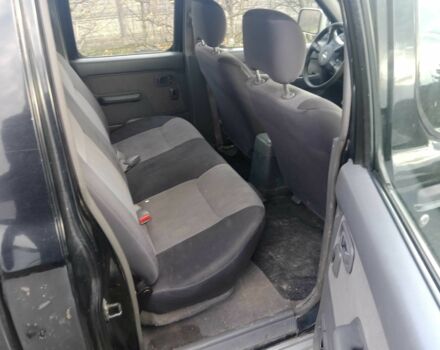 Чорний Ніссан Навара, об'ємом двигуна 2.5 л та пробігом 350 тис. км за 6174 $, фото 1 на Automoto.ua