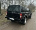 Черный Ниссан Навара, объемом двигателя 2.5 л и пробегом 213 тыс. км за 6000 $, фото 3 на Automoto.ua