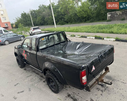 Чорний Ніссан Навара, об'ємом двигуна 2.5 л та пробігом 230 тис. км за 5000 $, фото 4 на Automoto.ua