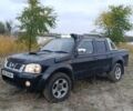 Черный Ниссан Навара, объемом двигателя 2.5 л и пробегом 100 тыс. км за 5300 $, фото 1 на Automoto.ua