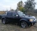 Черный Ниссан Навара, объемом двигателя 2.5 л и пробегом 100 тыс. км за 5300 $, фото 1 на Automoto.ua