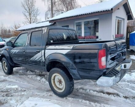 Чорний Ніссан Навара, об'ємом двигуна 2.5 л та пробігом 168 тис. км за 2649 $, фото 2 на Automoto.ua