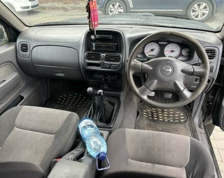 Черный Ниссан Навара, объемом двигателя 2.5 л и пробегом 220 тыс. км за 4250 $, фото 10 на Automoto.ua