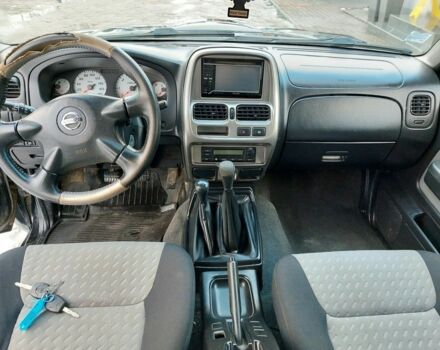 Черный Ниссан Навара, объемом двигателя 2.5 л и пробегом 178 тыс. км за 2750 $, фото 12 на Automoto.ua