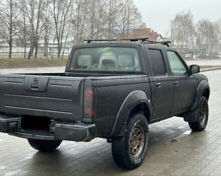 Черный Ниссан Навара, объемом двигателя 2.5 л и пробегом 200 тыс. км за 3450 $, фото 4 на Automoto.ua