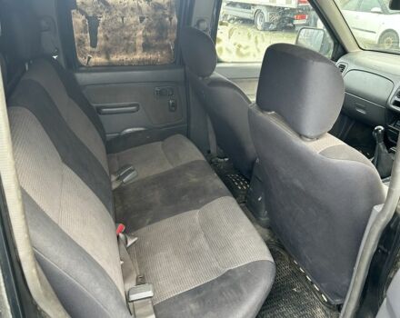 Черный Ниссан Навара, объемом двигателя 2.5 л и пробегом 220 тыс. км за 4250 $, фото 9 на Automoto.ua