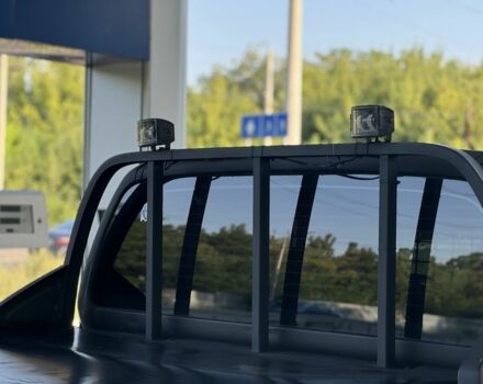 Черный Ниссан Навара, объемом двигателя 2.5 л и пробегом 245 тыс. км за 8600 $, фото 7 на Automoto.ua