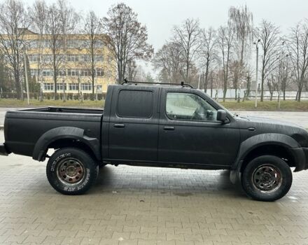 Черный Ниссан Навара, объемом двигателя 2.5 л и пробегом 200 тыс. км за 3450 $, фото 5 на Automoto.ua