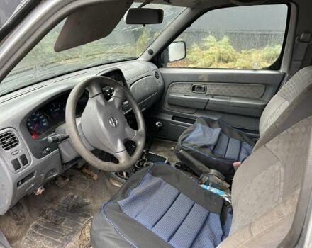 Черный Ниссан Навара, объемом двигателя 2.5 л и пробегом 200 тыс. км за 3450 $, фото 8 на Automoto.ua