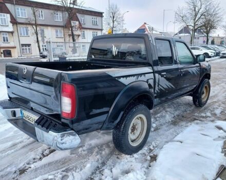 Чорний Ніссан Навара, об'ємом двигуна 2.5 л та пробігом 168 тис. км за 2649 $, фото 4 на Automoto.ua