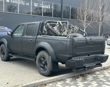 Черный Ниссан Навара, объемом двигателя 2.5 л и пробегом 220 тыс. км за 4250 $, фото 4 на Automoto.ua