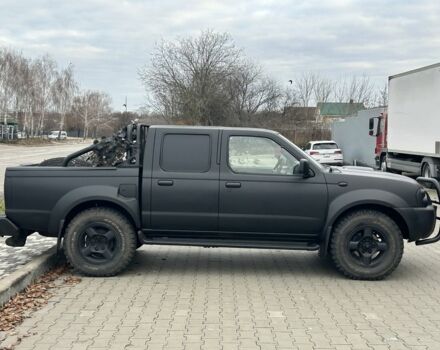 Черный Ниссан Навара, объемом двигателя 2.5 л и пробегом 220 тыс. км за 4250 $, фото 1 на Automoto.ua