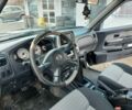 Черный Ниссан Навара, объемом двигателя 2.5 л и пробегом 178 тыс. км за 2750 $, фото 7 на Automoto.ua