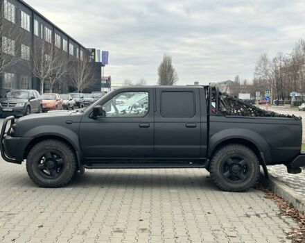 Черный Ниссан Навара, объемом двигателя 2.5 л и пробегом 220 тыс. км за 4250 $, фото 5 на Automoto.ua