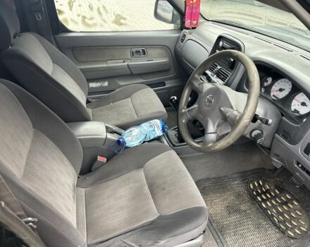 Черный Ниссан Навара, объемом двигателя 2.5 л и пробегом 220 тыс. км за 4250 $, фото 8 на Automoto.ua