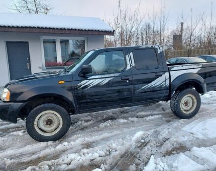 Чорний Ніссан Навара, об'ємом двигуна 2.5 л та пробігом 168 тис. км за 2649 $, фото 1 на Automoto.ua