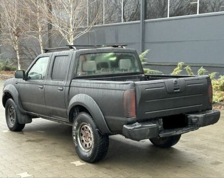 Черный Ниссан Навара, объемом двигателя 2.5 л и пробегом 200 тыс. км за 3450 $, фото 2 на Automoto.ua