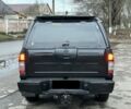 Черный Ниссан Навара, объемом двигателя 2.5 л и пробегом 200 тыс. км за 4650 $, фото 3 на Automoto.ua