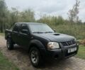 Черный Ниссан Навара, объемом двигателя 2.5 л и пробегом 282 тыс. км за 3299 $, фото 1 на Automoto.ua