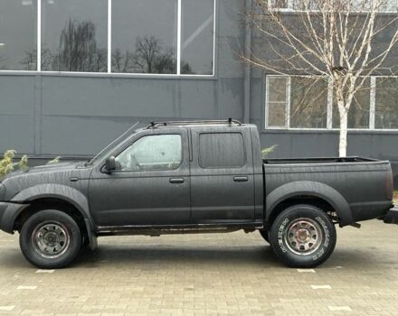 Черный Ниссан Навара, объемом двигателя 2.5 л и пробегом 200 тыс. км за 3450 $, фото 1 на Automoto.ua