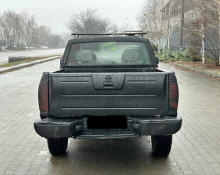 Черный Ниссан Навара, объемом двигателя 2.5 л и пробегом 200 тыс. км за 3450 $, фото 3 на Automoto.ua