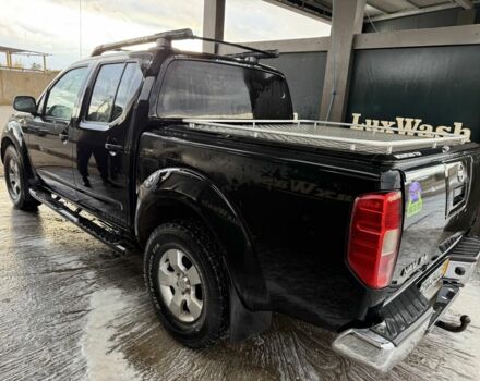 Черный Ниссан Навара, объемом двигателя 2.5 л и пробегом 325 тыс. км за 6000 $, фото 1 на Automoto.ua