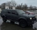 Чорний Ніссан Навара, об'ємом двигуна 2.5 л та пробігом 200 тис. км за 3999 $, фото 1 на Automoto.ua