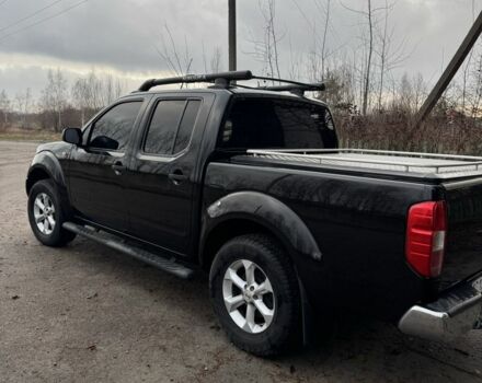 Черный Ниссан Навара, объемом двигателя 2.5 л и пробегом 330 тыс. км за 11999 $, фото 2 на Automoto.ua