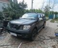 Черный Ниссан Навара, объемом двигателя 2.5 л и пробегом 238 тыс. км за 6526 $, фото 1 на Automoto.ua