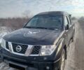 Черный Ниссан Навара, объемом двигателя 2.49 л и пробегом 279 тыс. км за 5800 $, фото 1 на Automoto.ua