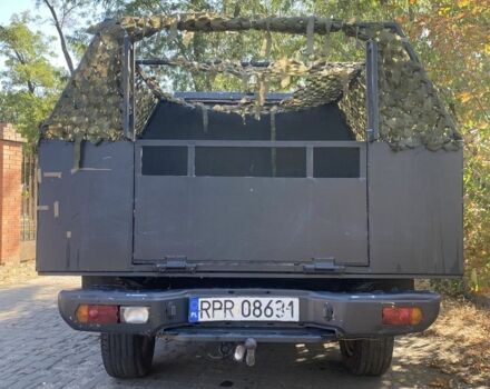 Черный Ниссан Навара, объемом двигателя 2.5 л и пробегом 150 тыс. км за 3800 $, фото 3 на Automoto.ua
