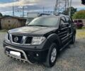 Черный Ниссан Навара, объемом двигателя 2.5 л и пробегом 150 тыс. км за 2600 $, фото 1 на Automoto.ua