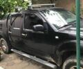 Черный Ниссан Навара, объемом двигателя 2.5 л и пробегом 289 тыс. км за 9800 $, фото 1 на Automoto.ua